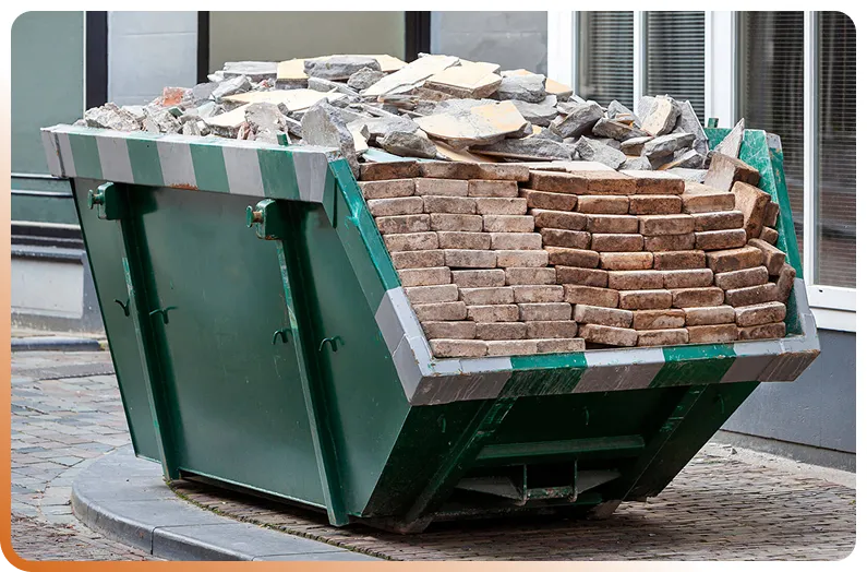 Heavy debris concrete dumpster rental